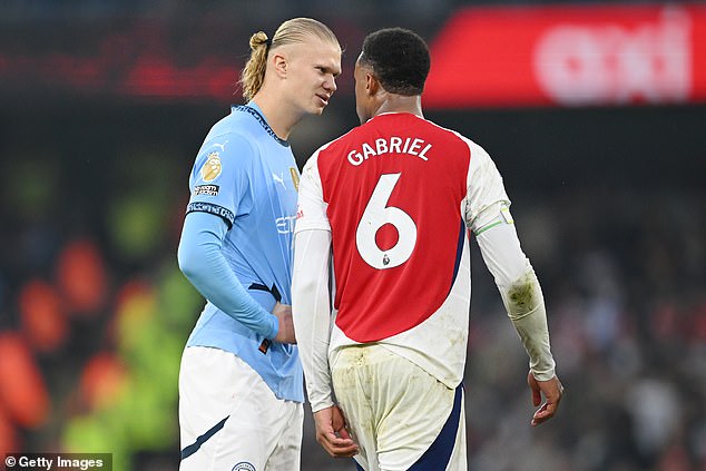 Erling Haaland (left) will not face any retrospective punishment after throwing the match ball at Gabriel Magalhaes (right) shortly after Man City's last-gasp equaliser against Arsenal