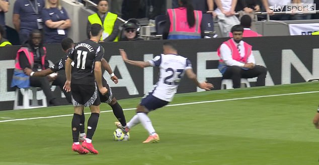 Jurrien Timber received just a yellow card after catching Tottenham's Pedro Porro on the ankle