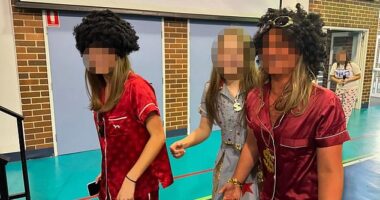 Photographs of two girls at an elite private girls' school have been deleted to avoid ‘misinterpretation', their principal said