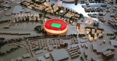 Manchester United's regeneration of Trafford Park could be worth billions to the UK economy (pictured: the first designs of a new Old Trafford, revealed at the Labour Party conference)