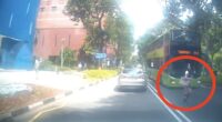 Headphone-wearing woman nearly knocked down by bus while jaywalking in Orchard - Mothership.SG