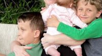 Beth Hobson, 55, from Manchester, began IVF fifteen years ago despite being told she only had a 10 per cent chance at conceiving naturally - pictured with her three children