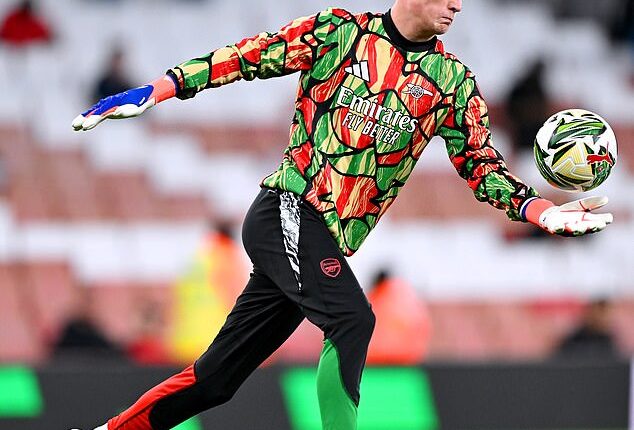 Jack Porter, 16, pictured warming-up ahead of his senior Arsenal debut against Bolton
