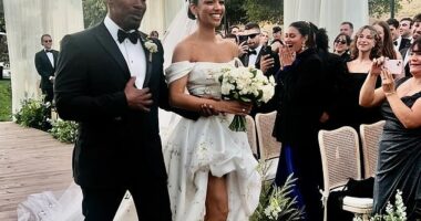 Jamie Foxx proudly walked his eldest daughter and Beats Shazam co-star - Corinne Foxx - down the aisle during her lavish wedding to college sweetheart Joe Hooten in Los Angeles on Saturday