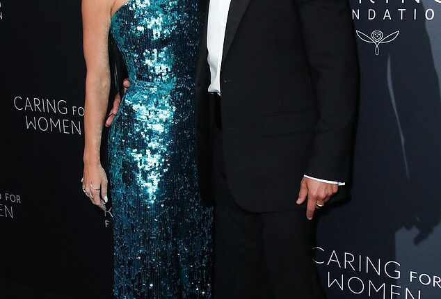 Katy Perry and Orlando Bloom stole the spotlight with their playful and affectionate display at the Kering Foundation's Caring for Women dinner on Monday