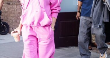 Katy Perry looked jovial as her partner Orlando Bloom trailed behind her in New York City