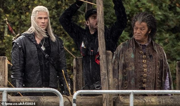Laurence Fishburne, 63, (R) has been for the first time on the set of The Witcher as he filmed scenes with co-star Liam Hemsworth, 34 (L) in North Wales