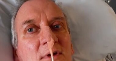 John Cross pictured in hospital where he spent seven months recovering after being diagnosed with Chronic Inflammatory Demyelinating Polyneuropathy