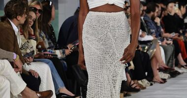 Naomi Campbell flashed her toned abs in a beaded skirt at star-studded Ralph Lauren show in Bridgehampton in New York on Thursday