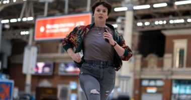 Alexandra Roach as Abby running through Victoria Station in BBC One's Nightsleeper