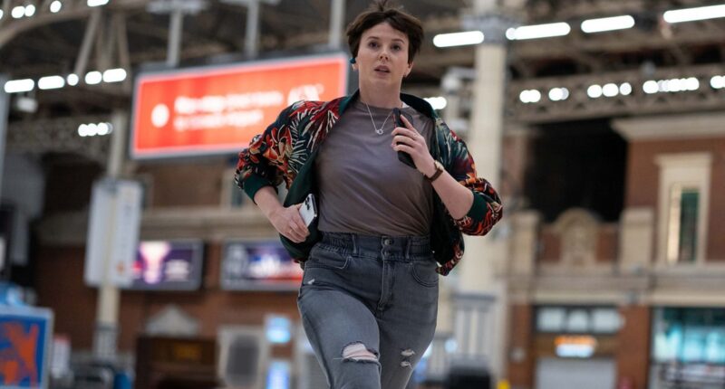 Alexandra Roach as Abby running through Victoria Station in BBC One's Nightsleeper