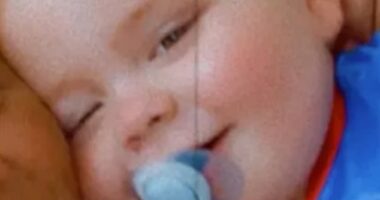 The toddler, whose name was today confirmed by a coroners' court as Carter Walsh (pictured), was fatally injured at his home in Wigan, Greater Manchester when a fireplace fell on him