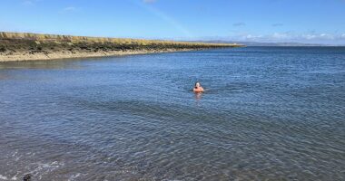 An image shared on social media shows Jeny Hastings swimming in Wardie Bay, Edinburgh in March, six months before she went missing from the same spot after going for a group swim  on Tuesday