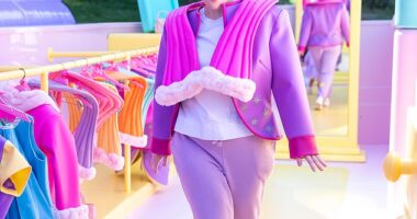 Rebel Wilson strutted her stuff down Polly Pocket's orange and purple runway, rocking an exact replica of the tiny doll's rubber snap-on clothing as her family visited the new Airbnb