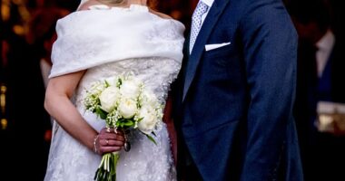 Princess Theodora and Mathew Kumar lovingly share a smooch as they leave the Cathedral
