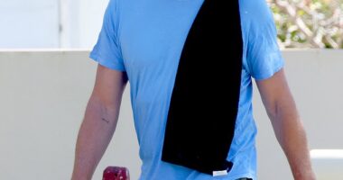 Simon Baker pictured walking to Icebergs gym on Tuesday