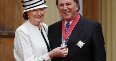 Sir Terry Wogan with his wife Lady Helen in 2016 as the broadcaster collected his knighthood