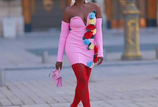 Suzan Mutesi (pictured) has worked hard to make her mark on the world of fashion. The reality star was certainly commanding attention as she arrived at Paris Fashion Week on Saturday