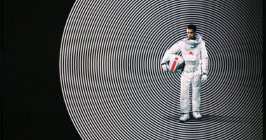Cropped detail of Sam Rockwell in a spacesuit for the poster for 2009 movie Moon