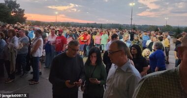 Nearly 6,000 event-goers wait outside as Tucker Carlson 's sit-down chat with JD Vance was hit by two hour delays over claims there were only eight metal detectors to screen everyone