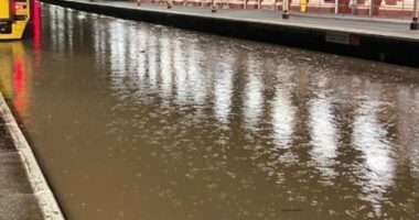 The Chiltern Main Line was blocked in Oxfordshire between Banbury and Bicester North this morning with one station left looking like a Venice canal after rain flooded the tracks