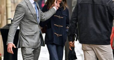 Victoria Beckham braved the rain as she stepped out in Paris ahead of her fashion week presentation in the capital on Friday