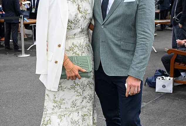 Zara Tindall revealed her husband Mike often helps her out when choosing glamorous ensembles (pictured at at the All England Lawn Tennis and Croquet Club)