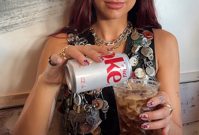 Taking to TikTok to share the strange combination she began: 'Step one, diet coke and then pickle juice, then a couple of pickles'