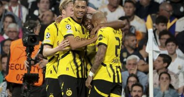 Jamie Gittens (centre right) made history when gave Borussia Dortmund a 2-0 lead during the first-half at the Bernabeu