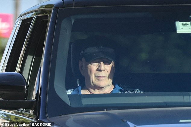 Bruce Willis was seen sitting in the passenger seat of his car as he was taken for a drive through sunny Los Angeles this week amid his dementia battle