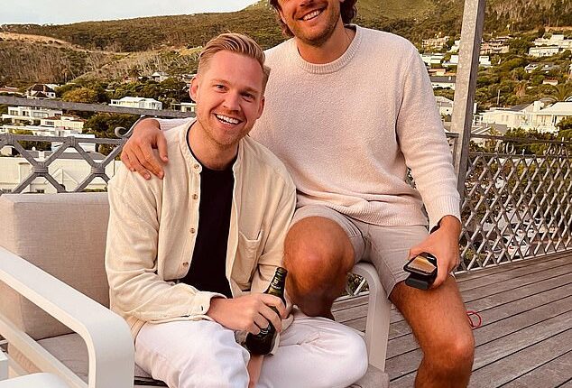 Daniel Cox and Nick Hodgins (pictured) have spent two years coming up with creative design solutions to conceal the 'horrid extension' at the bottom of their garden