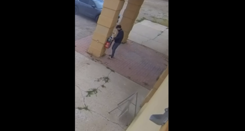 Dem Operative Appears To Tamper With Drop Box On Video