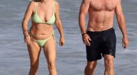 Kate Walsh appears to be loving her life Down Under as she hit the beach in Perth with her fiancé Andrew Nixon on Thursday