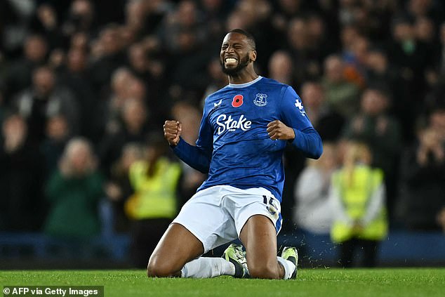Substitute Beto celebrates after he scored a late equaliser for Everton against Fulham