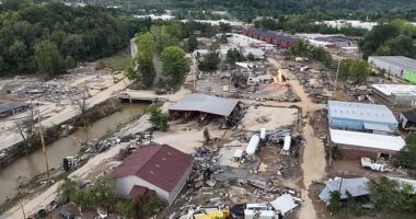 An aerial view of flood damage wrought by Hurricane Helene along the Swannanoa River on October 3, 2024 in Asheville, North Carolina. FEMA and other emergency-management whistleblowers allege the agency wasted funds, withheld pre-disaster aid and was slow to deploy first responders and service members to help with recovery efforts