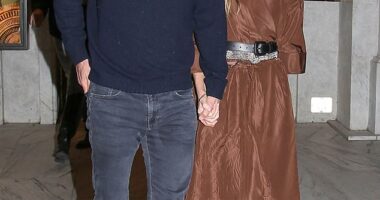 Hilary Swank put on a loved-up display with her handsome husband Philip Schneider as they stepped out for the Miu Miu afterparty during Paris Fashion Week on Tuesday night