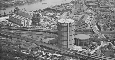 Battersea Power Station under construction and the Gas Holder Station, Wandsworth, Greater London. It was built by the London Power Company to supply almost one fifth of London's electricity