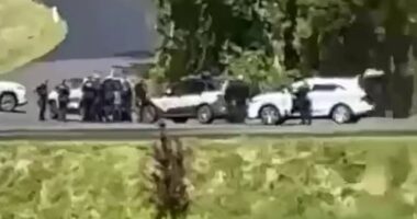 Police converge on the rural property where a siege is believed to be in progress