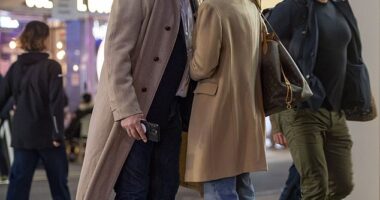 Hugh Bonneville confirmed his new romance with Heidi Kadlecova as they packed on the PDA in London on Friday evening