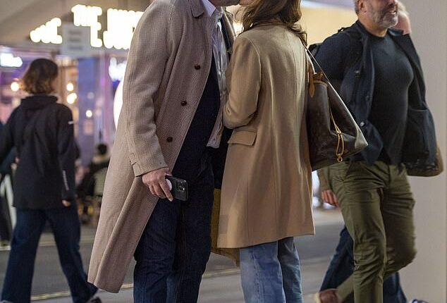 Hugh Bonneville confirmed his new romance with Heidi Kadlecova as they packed on the PDA in London on Friday evening