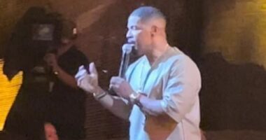 Jamie Foxx, 56, addressed whether Sean 'Diddy' Combs, 54, was 'responsible' for his 2023 hospitalization while taping his Netflix Special, What Had Happened Was; seen on stage