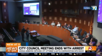 Rebekah Massie being removed from public meeting.
