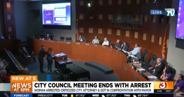 Rebekah Massie being removed from public meeting.