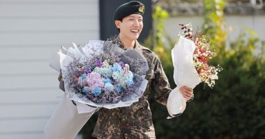 J-Hope was greeted by a crowd of fans and one of his BTS bandmates as he was discharged from military service on Thursday in Wonju, South Korea
