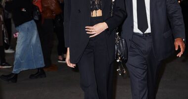 Kaia Gerber showed off her toned abs in a sexy black lace crop top and a matching trouser suit as she attended a screening of Saturday Night at The Crosby Hotel in New York on Tuesday