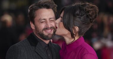 Kieran Culkin's, 42, wife Jazz Charton, 36, placed a very affectionate kiss on the actor's cheek as they attended the UK premiere of his new movie A Real Pain on Sunday