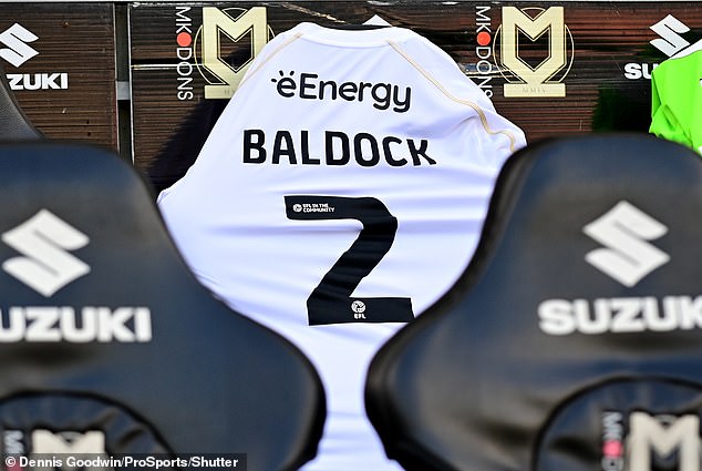 MK Dons paid tribute to their former player George Baldock ahead of facing Port Vale