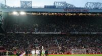A Manchester United fan has been arrested after a police officer had his hat knocked off in the Stretford End on Saturday