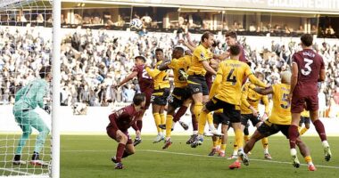John Stones fired Manchester City with a stoppage-time header against Wolves on Sunday