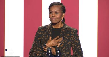 Michelle Obama spoke about her own 'debilitating' struggles through menopause as she challenged men to support Kamala Harris ' bid to be America's first female president